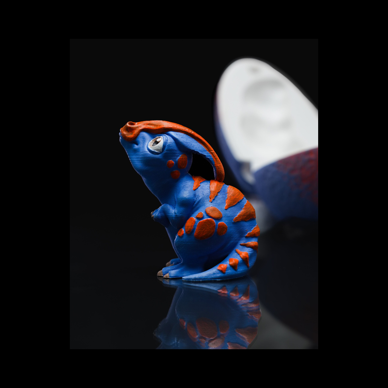 Figura decorativa con forma de huevo Parasaurolophus