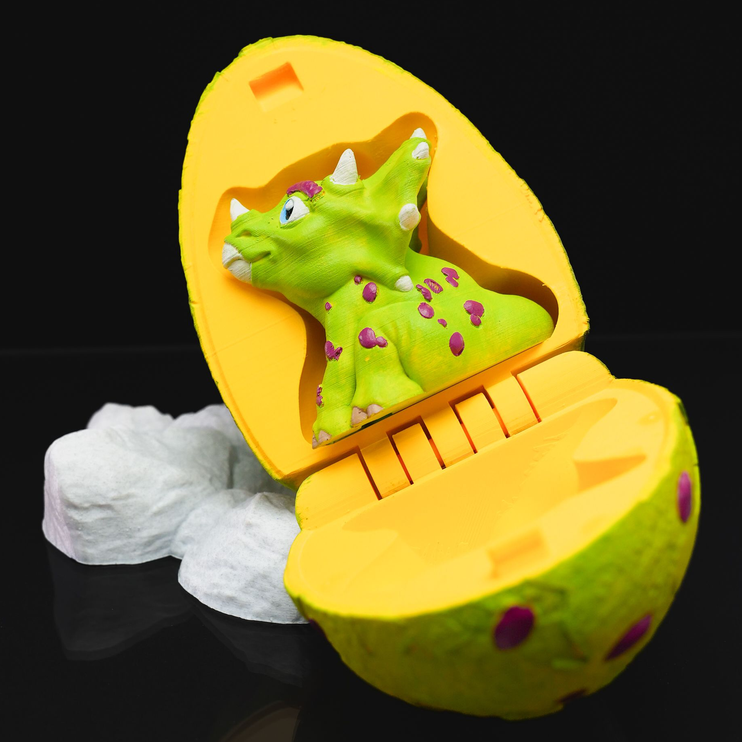 Figura decorativa con forma de huevo Triceratops