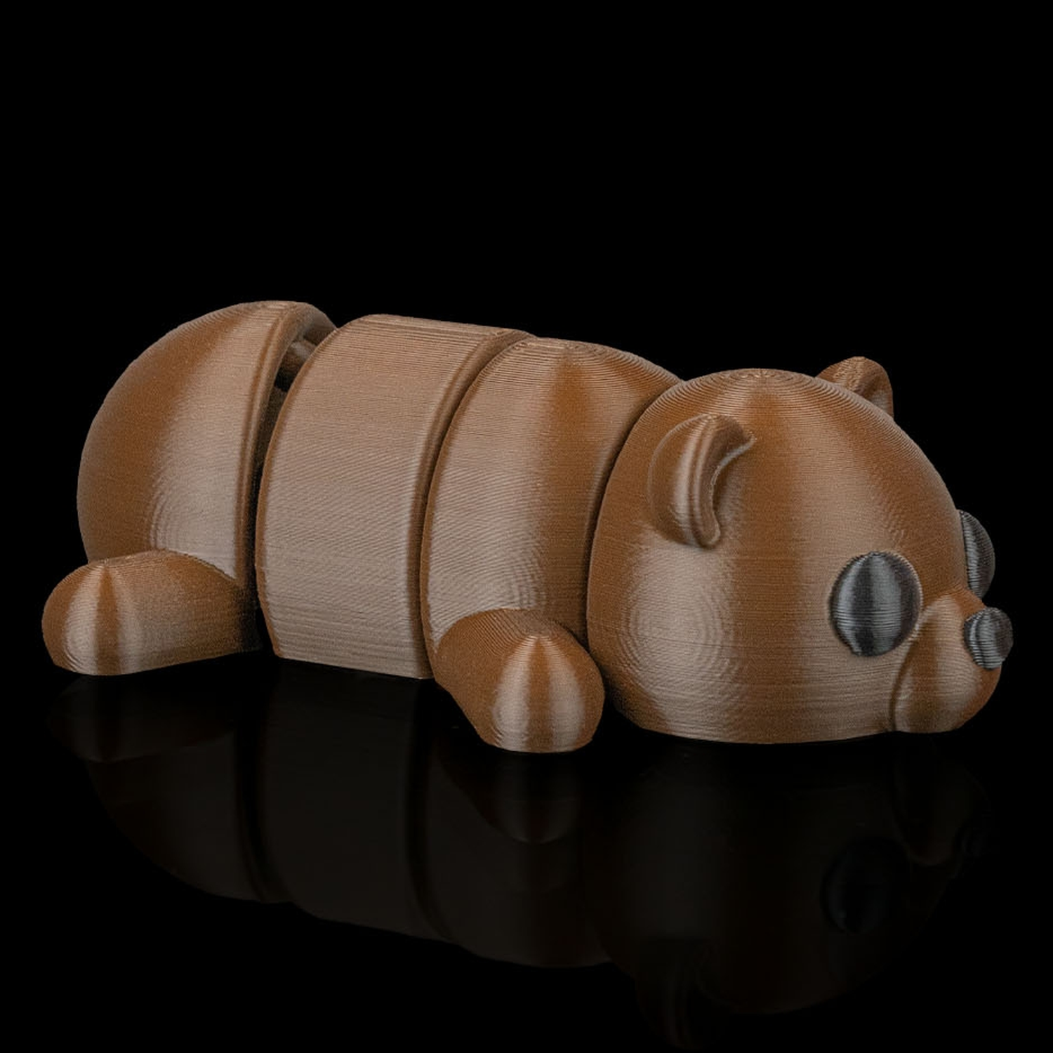 Llavero de oso tumbado