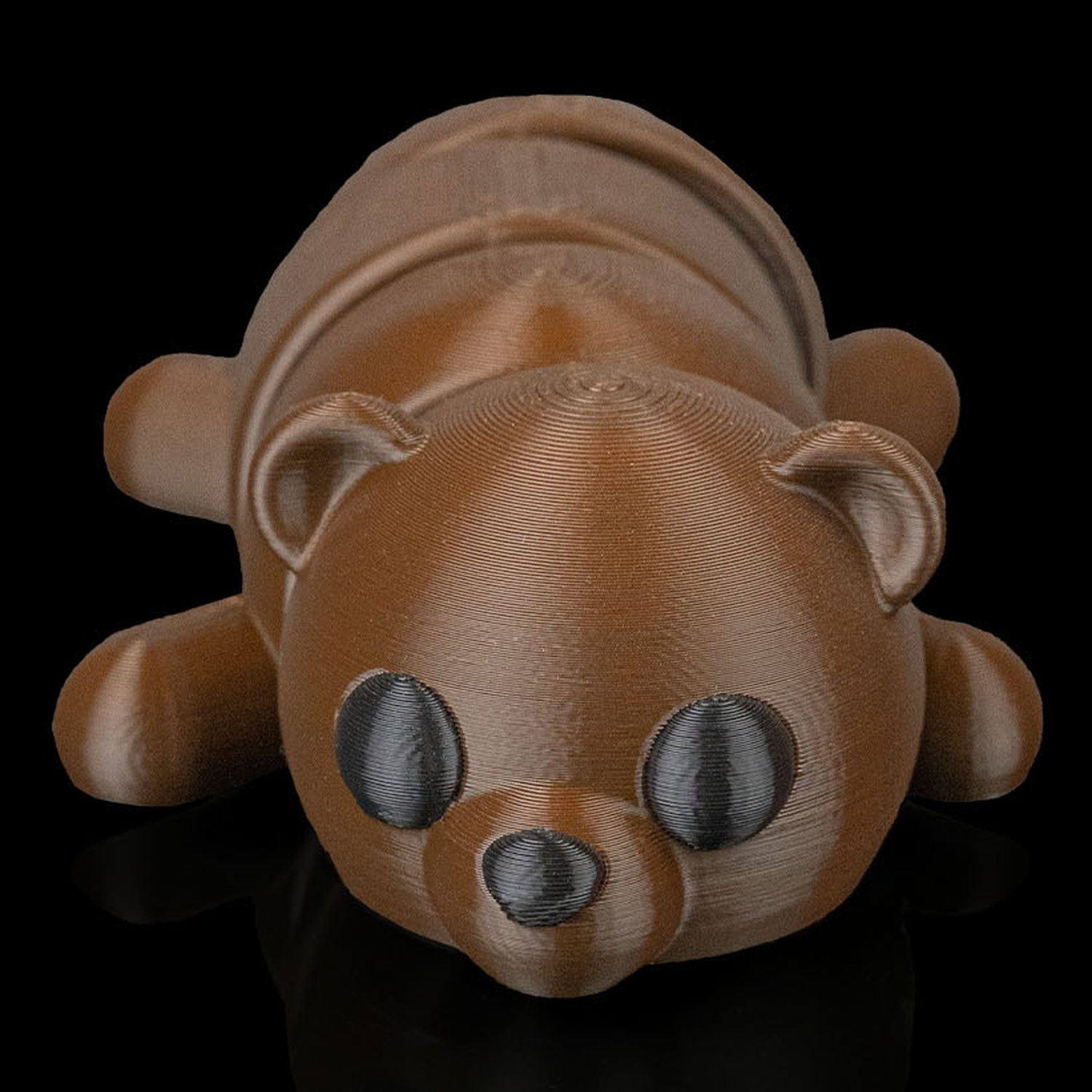 Llavero de oso tumbado