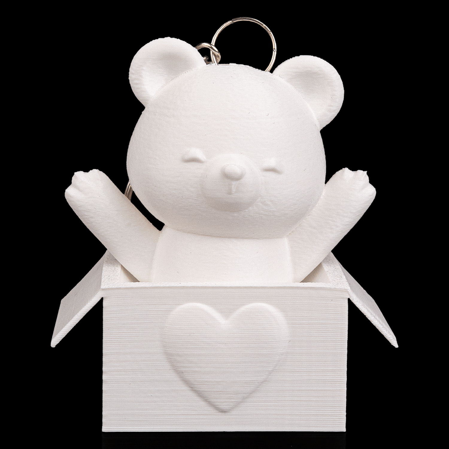 Llavero de oso en caja sorpresa Peek-a-Bear