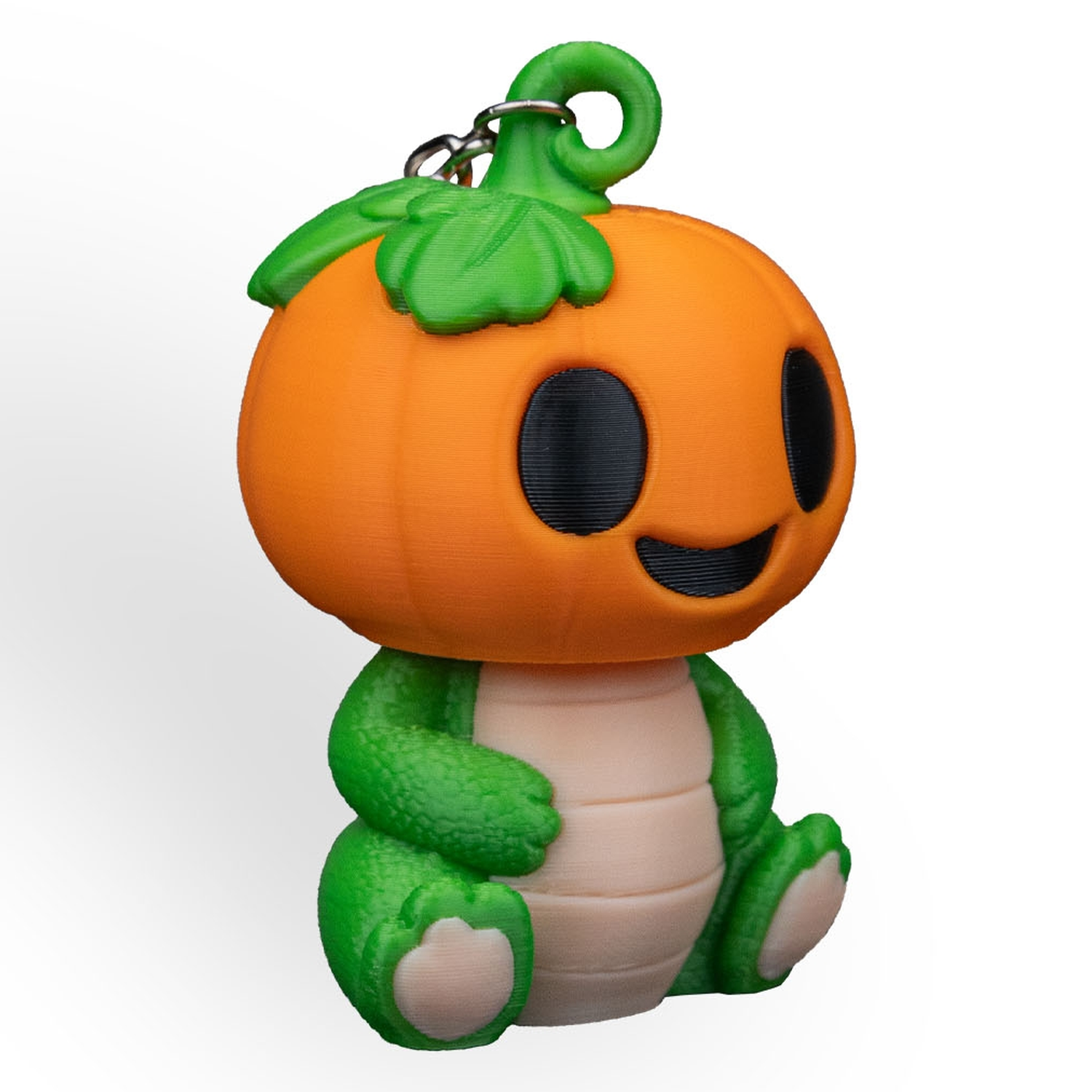 Llavero de dinosaurio calabaza Dino PumpKing