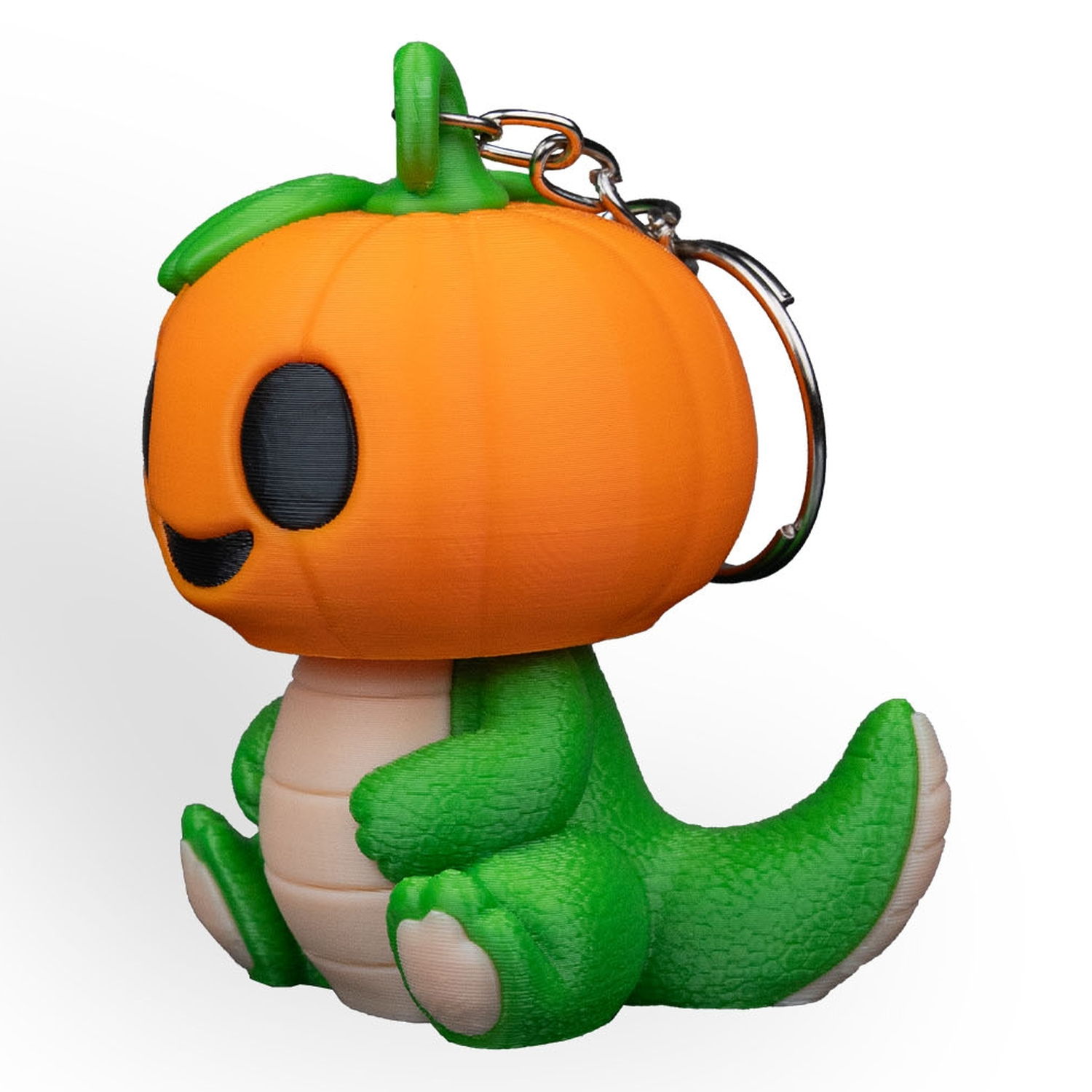 Llavero de dinosaurio calabaza Dino PumpKing