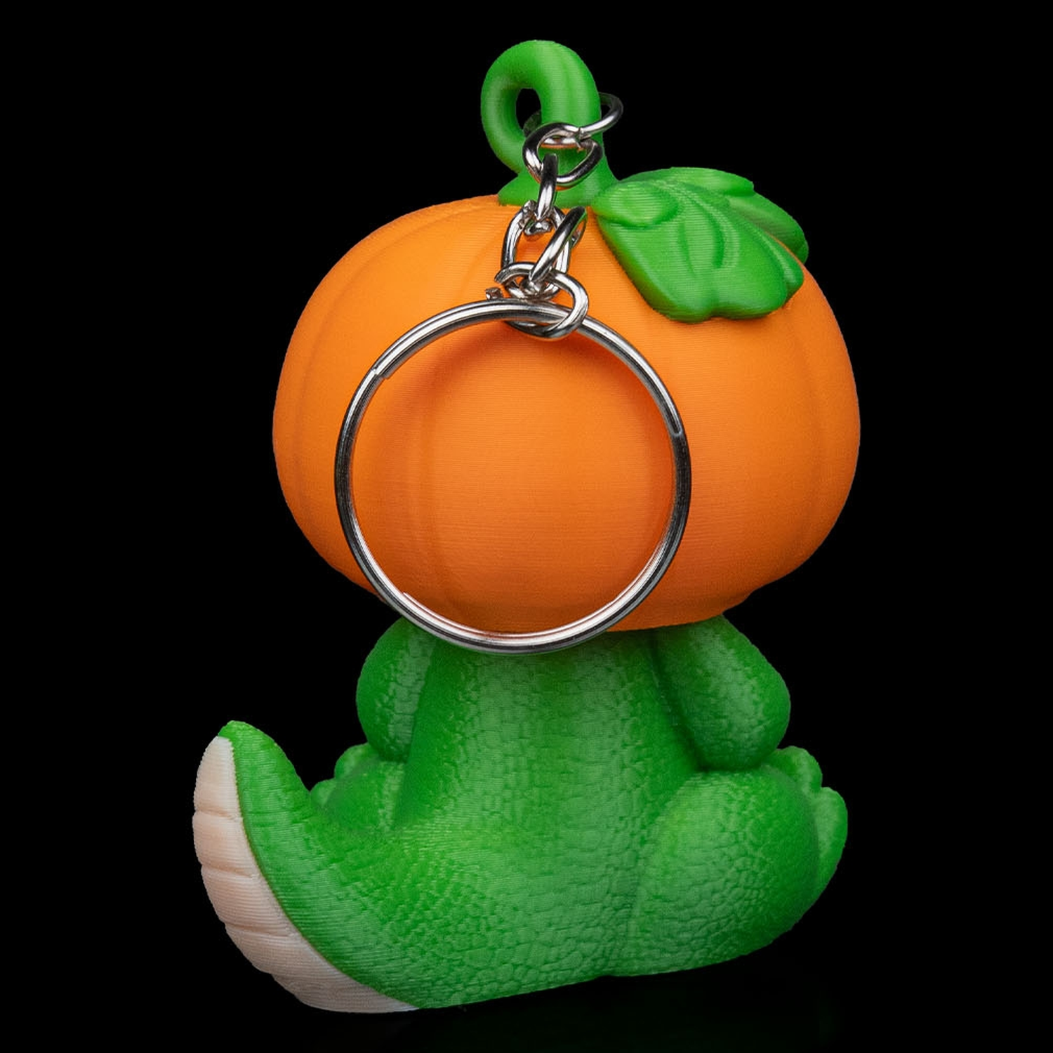 Llavero de dinosaurio calabaza Dino PumpKing