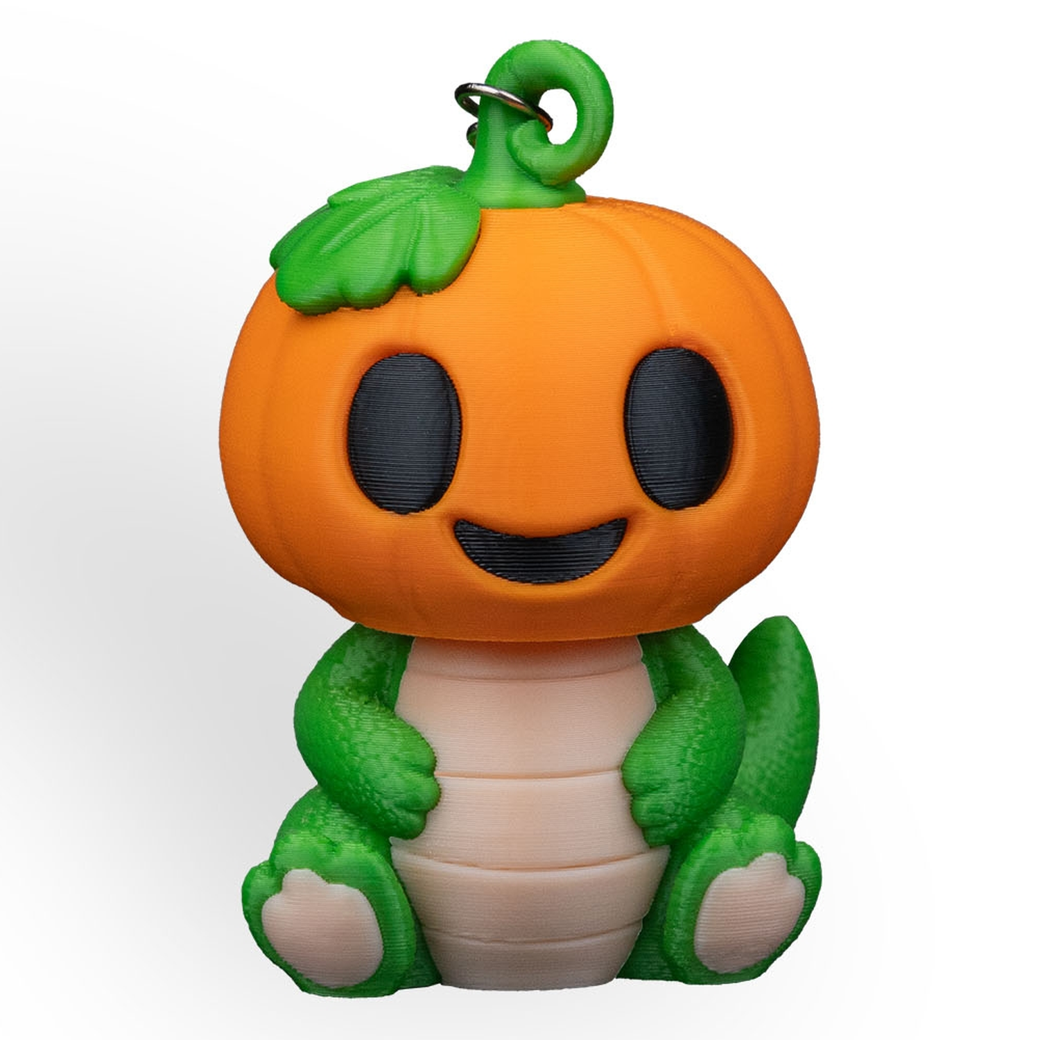 Llavero de dinosaurio calabaza Dino PumpKing