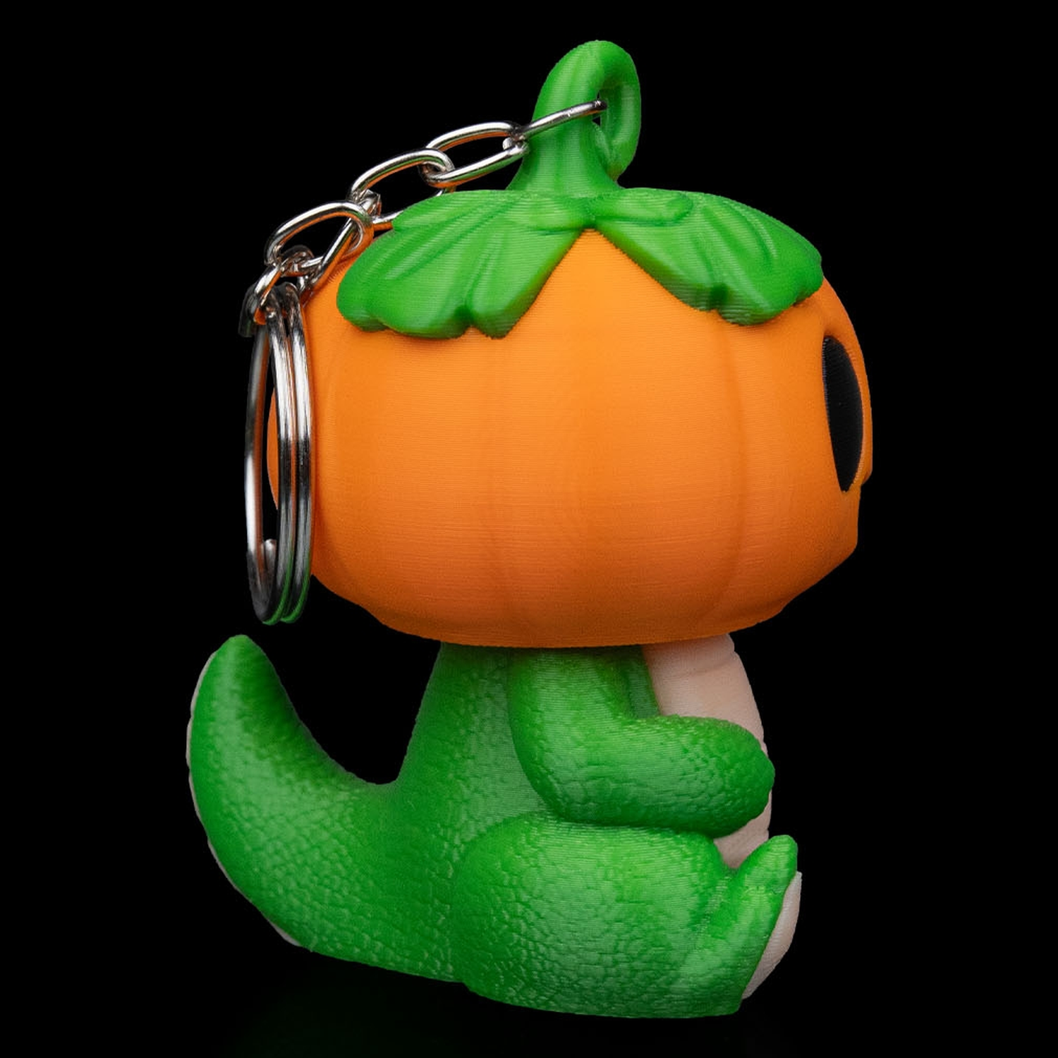 Llavero de dinosaurio calabaza Dino PumpKing