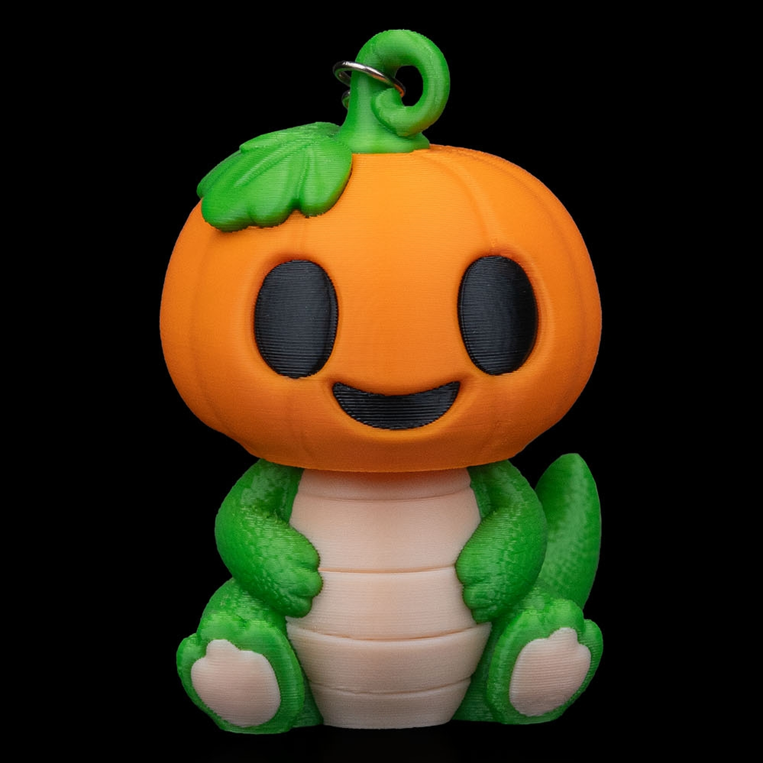 Llavero de dinosaurio calabaza Dino PumpKing