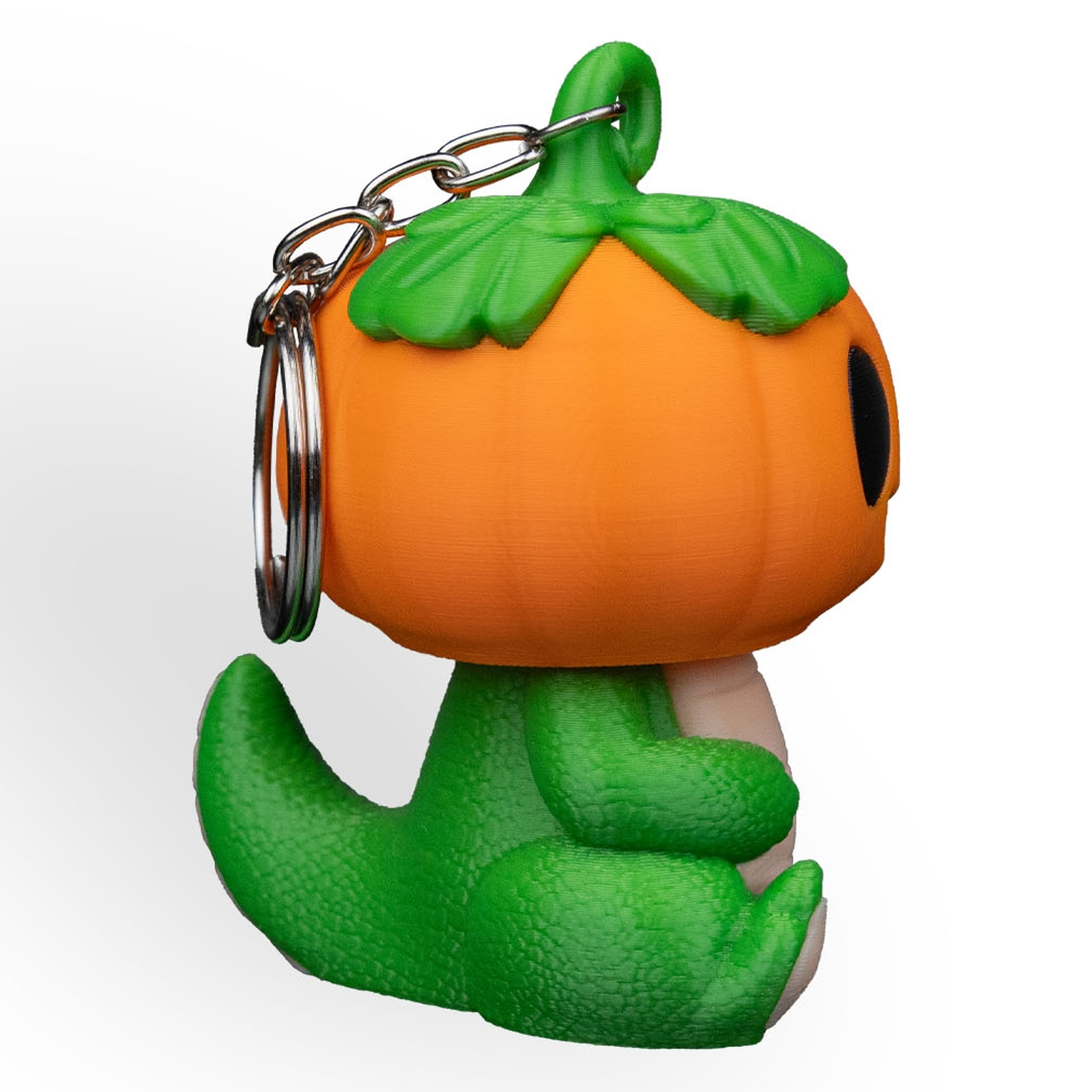 Llavero de dinosaurio calabaza Dino PumpKing