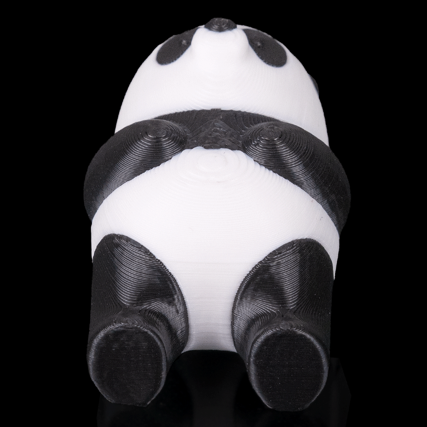 Panda tumbado para juego de equilibrio
