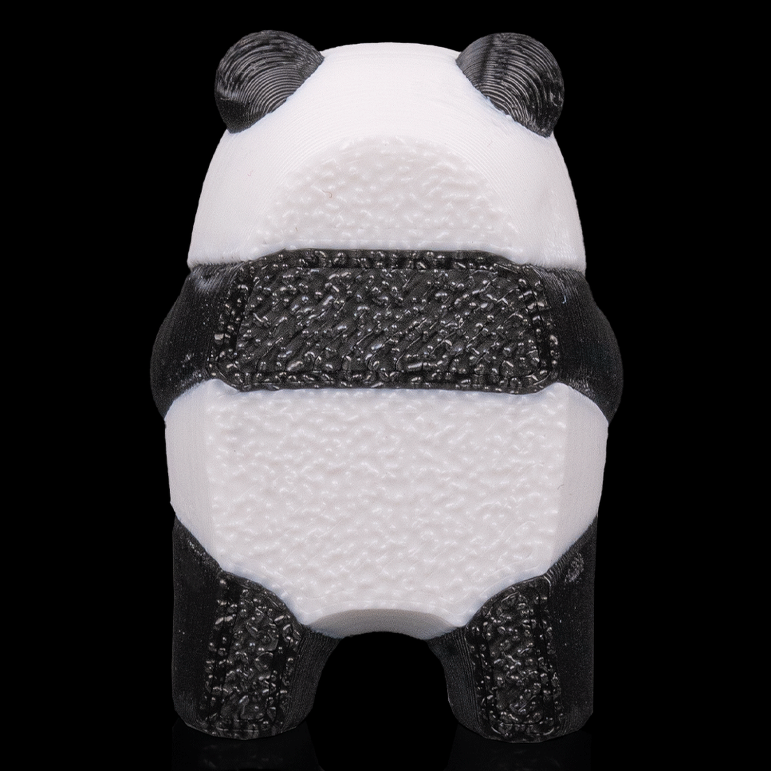 Panda tumbado para juego de equilibrio