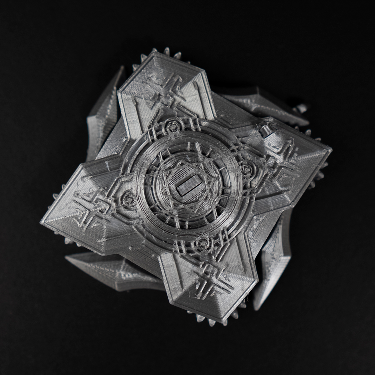 Figura shuriken decorativa