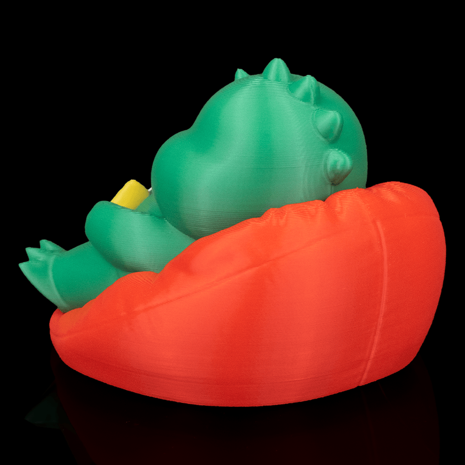 Llavero de dinosaurio regordete