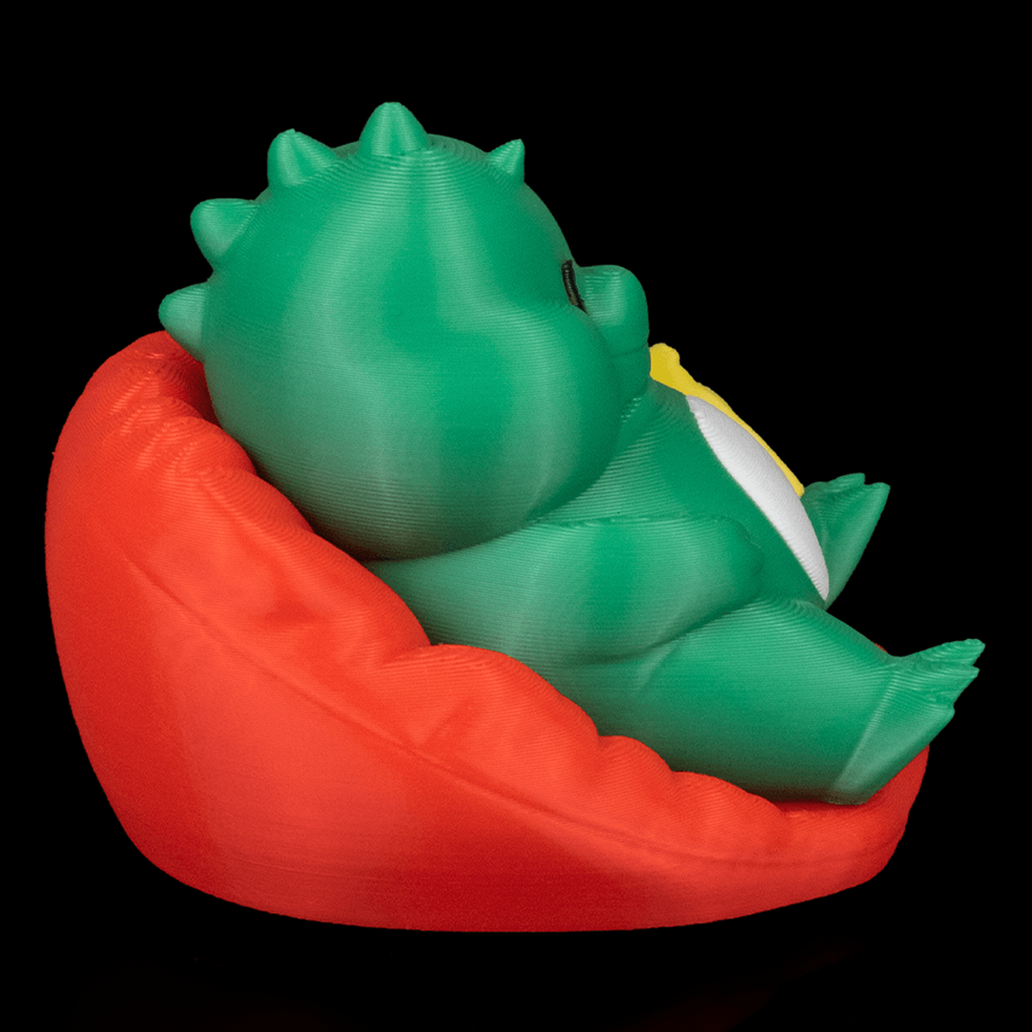 Llavero de dinosaurio regordete