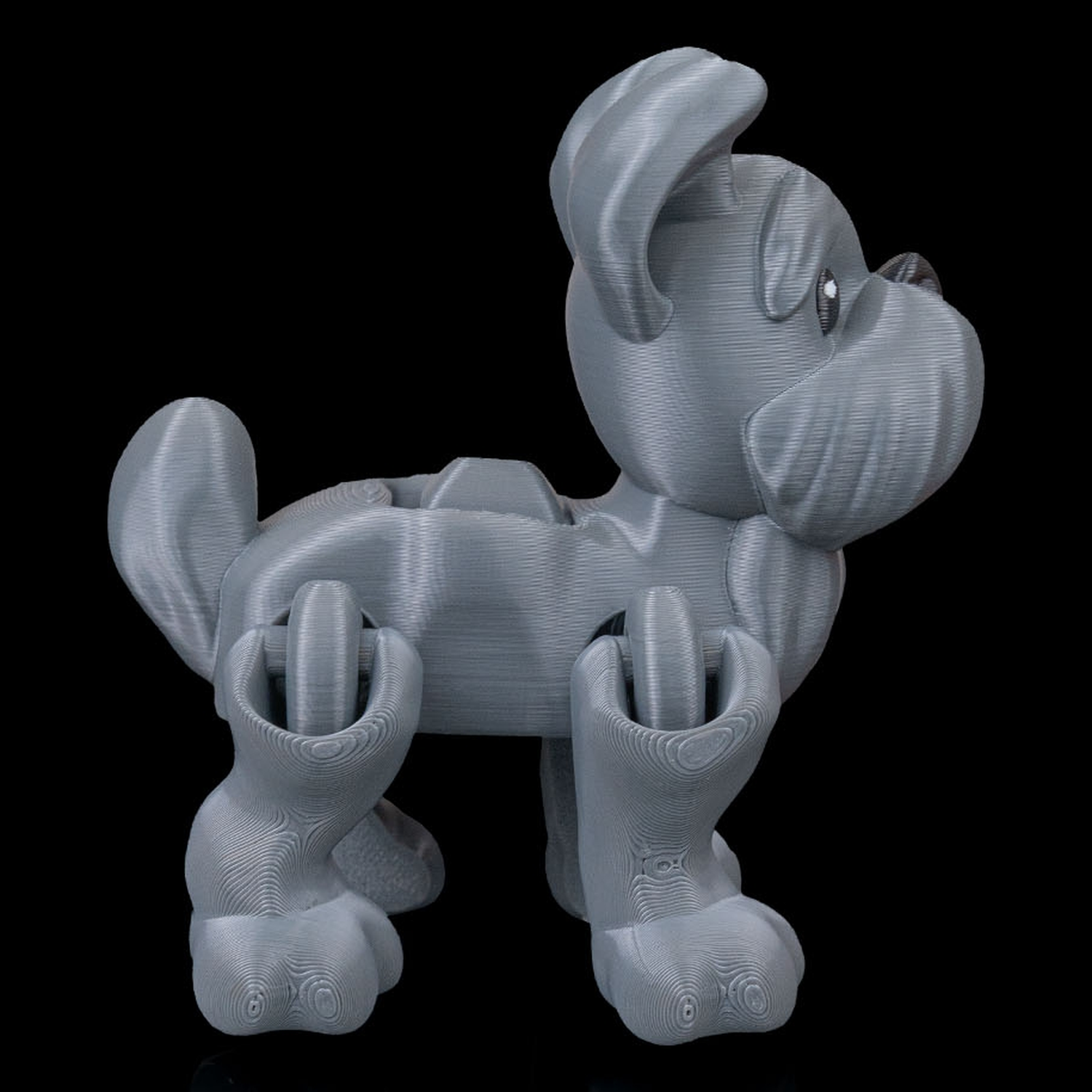 Juguete articulado Press the Puppy