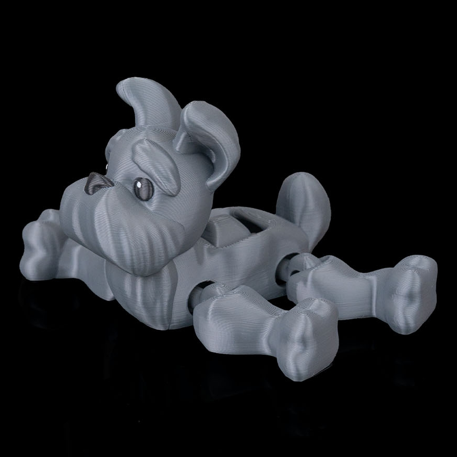 Juguete articulado Press the Puppy
