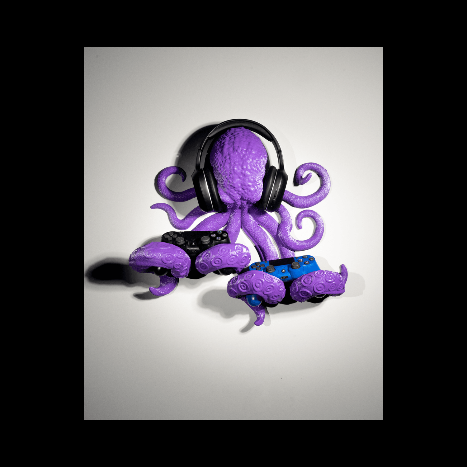 Soporte para mando y auriculares Octopus